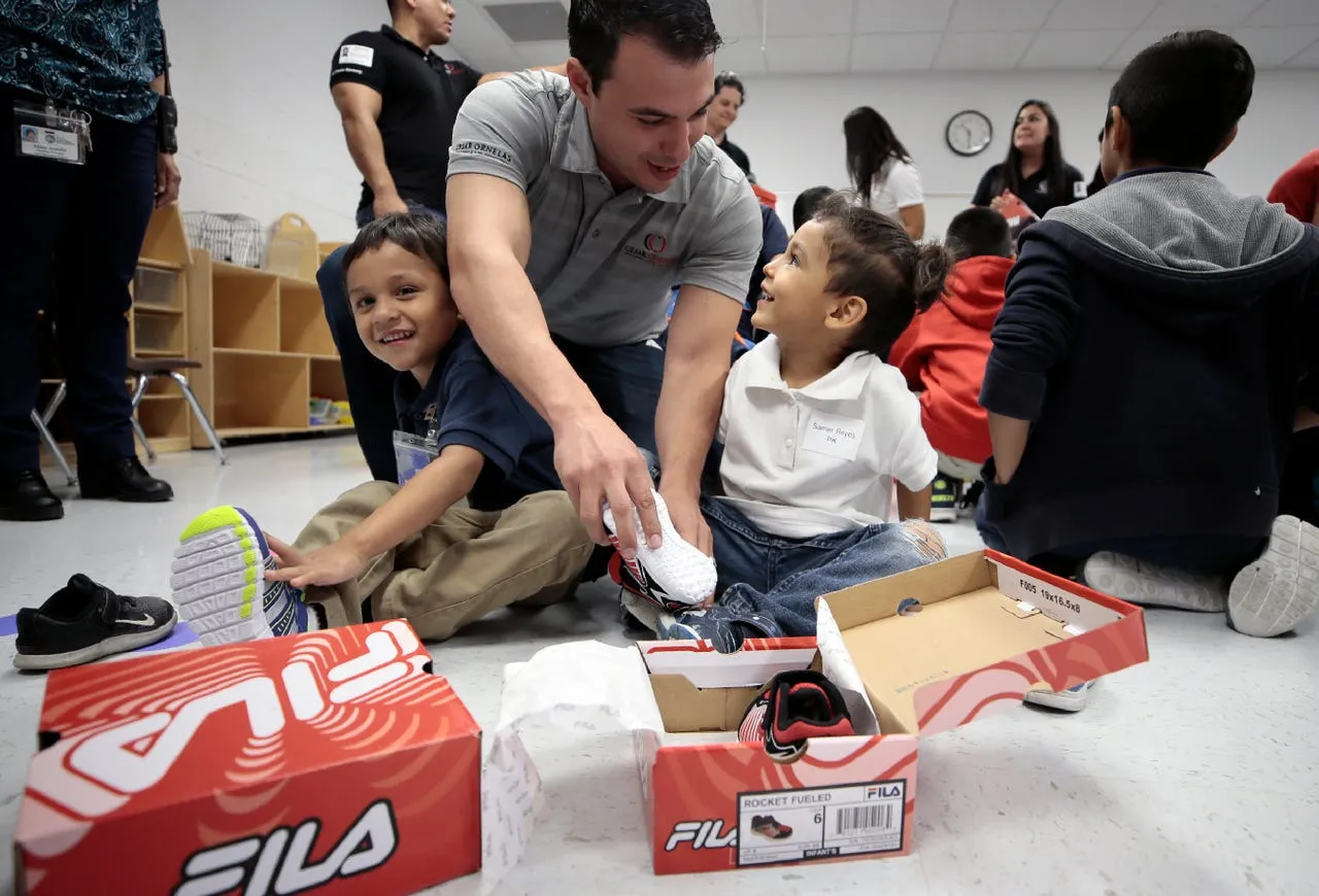 Cesar Ornelas Gives back at a rotary club shoe giveaway.