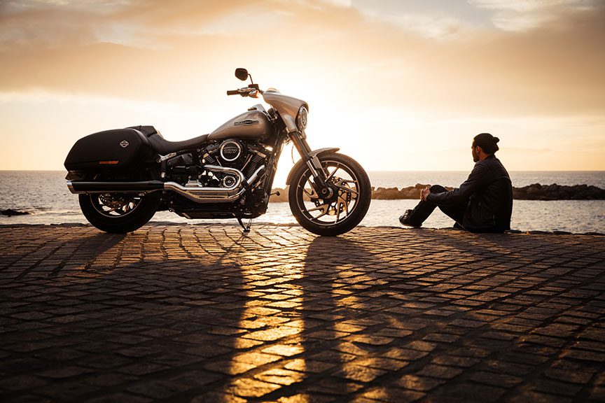 motorcyle-man-looking-sunset