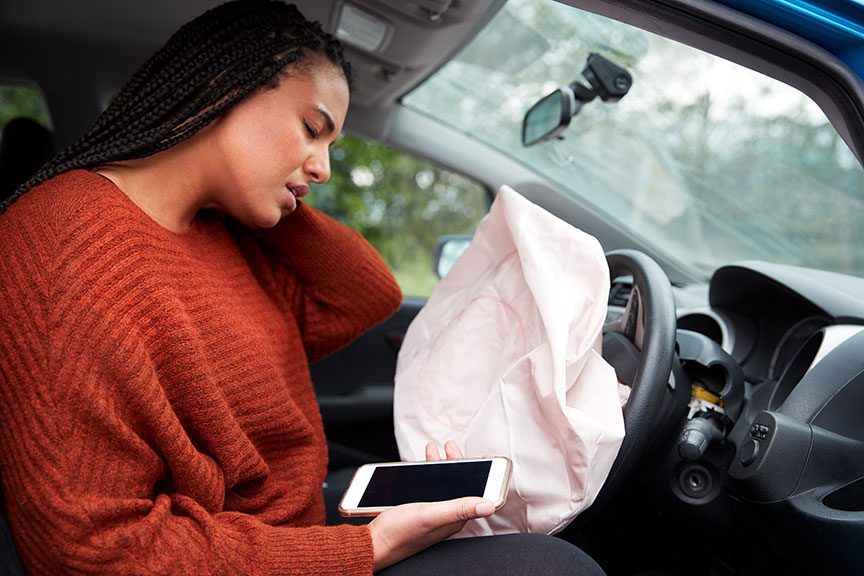 female-motorist-injured-in-car-crash-airbag-deployed