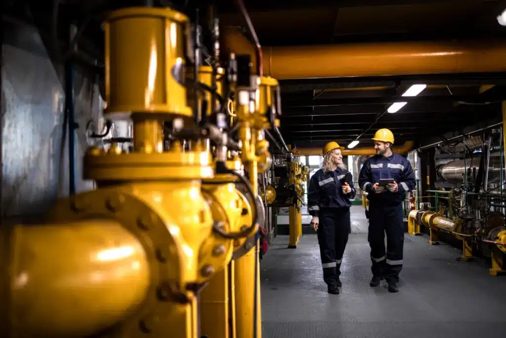 Oil and gas workers walking.