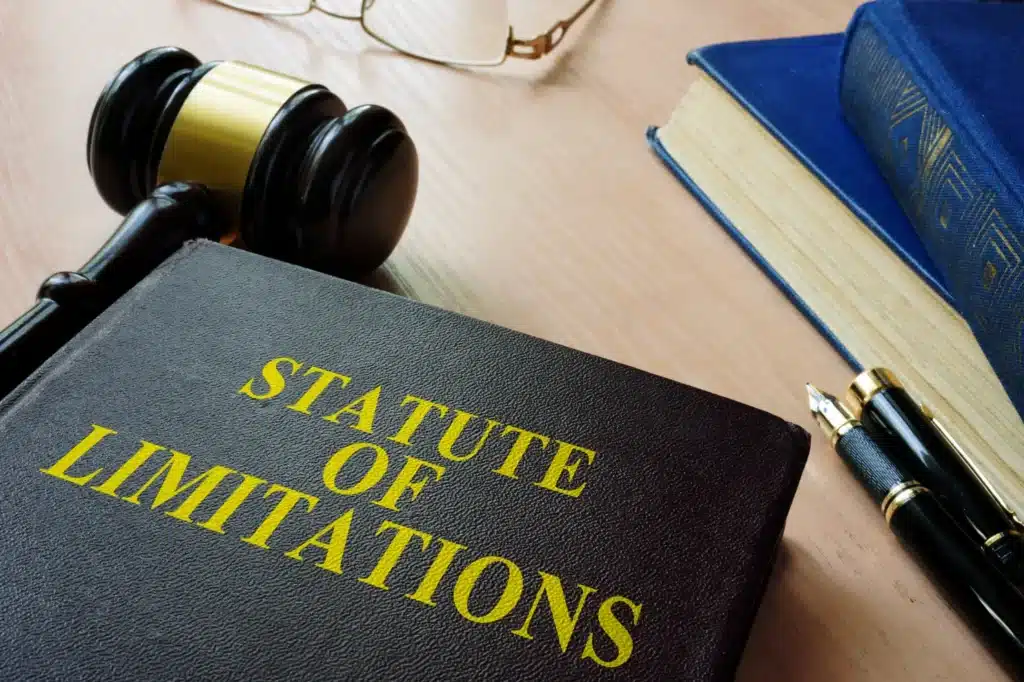 A book with the Statute of Limitations and a gavel.