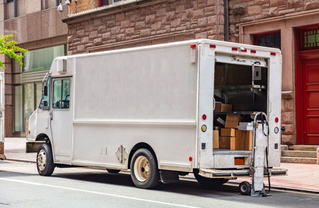 A commercial truck loading cargo.